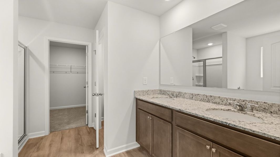 Representative furnished interior of a home built from the Hanover by D.R. Horton in Northwoods at Mirror Lake, Villa Rica (Image 12).