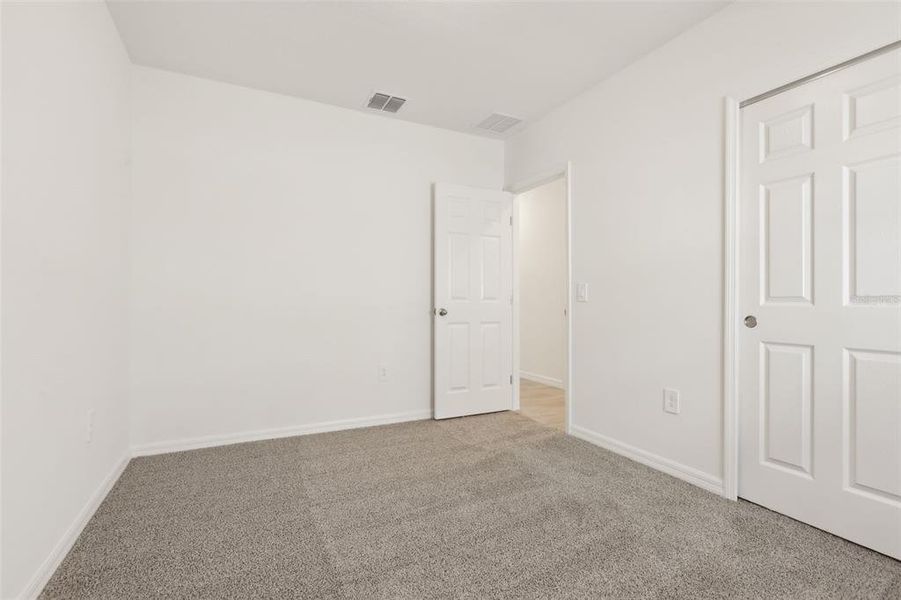 Spacious, unfurnished interior of a new home in Springs at Lake Alfred - Signature Series, Lake Alfred (Image 25).