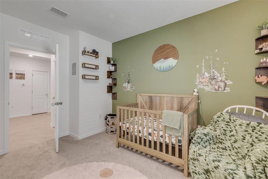 Furnished interior view inside a new home in Groveside at Ormond Station, Ormond Beach (Image 5).