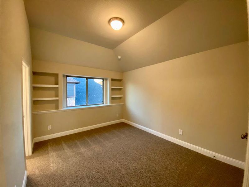 Bed 3 with built-in shelves shares a Jack & Jill bathroom