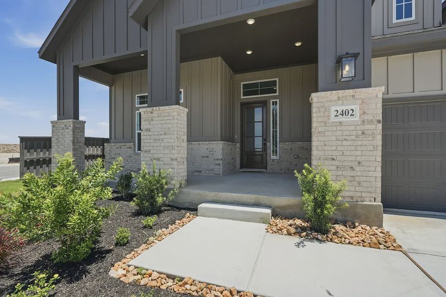 Representative exterior details of a home built from the Kingston by Chesmar Homes in Prominence 60's, San Antonio (Image 4).