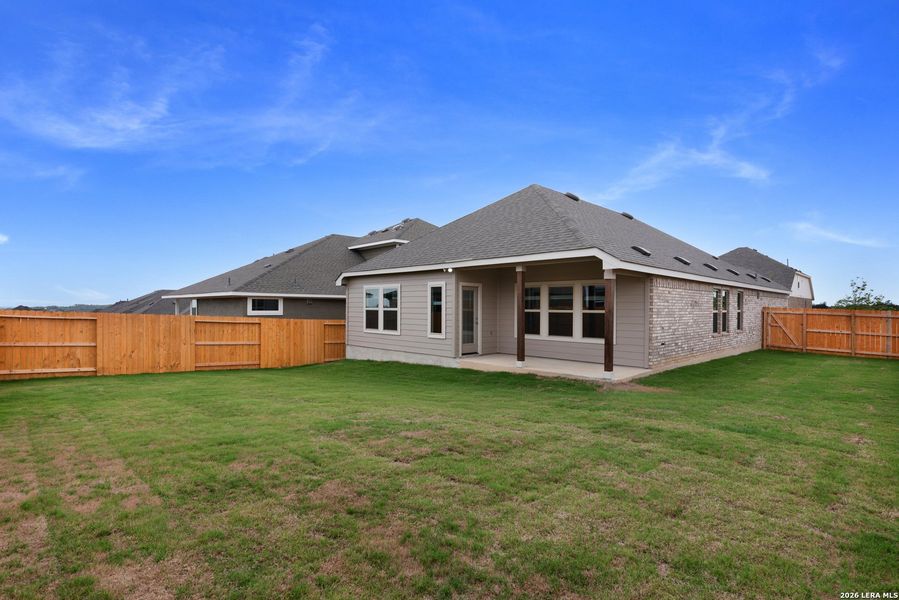Exterior details and patio area of a home in Meyer Ranch - Enclave, New Braunfels (Image 13).