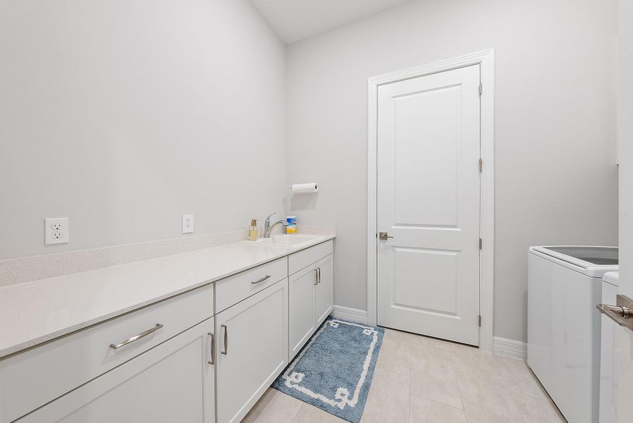 Furnished interior view inside a new home in Avondale at Avenir, Palm Beach Gardens (Image 6).