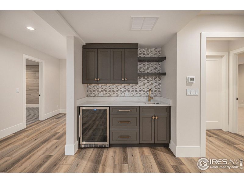 Basement built in wet bar with beverage fridge Basement built in wet bar with beverage fridge