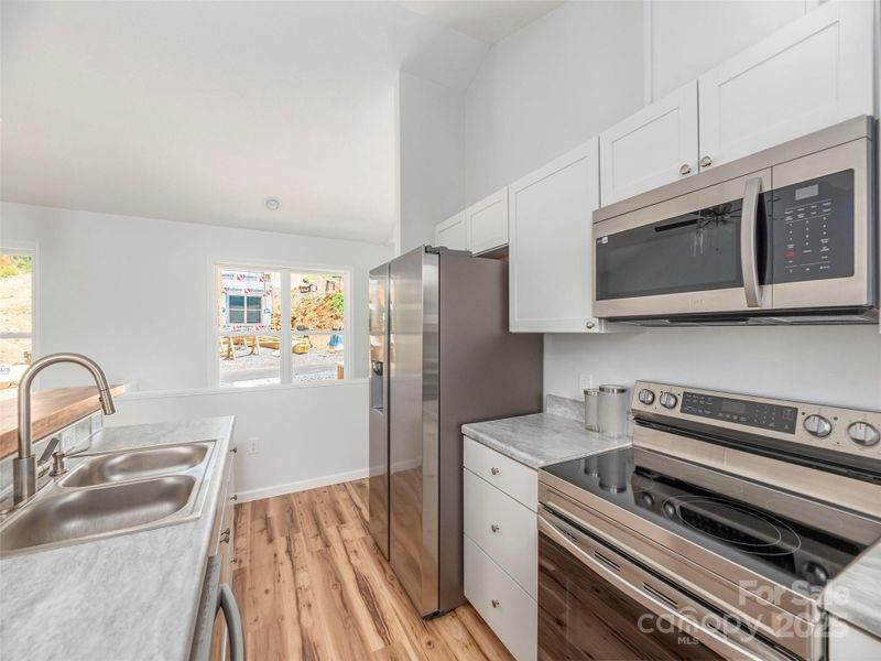 Furnished interior view inside a new home in , Waynesville (Image 3). Furnished interior view inside a new home in , Waynesville (Image 3).