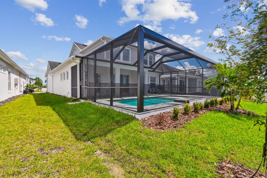 Representative exterior details of a home built from the The Flatwater by David Weekley Homes in Emerald Landing at Waterside at Lakewood Ranch – Lake Series, Sarasota (Image 4).