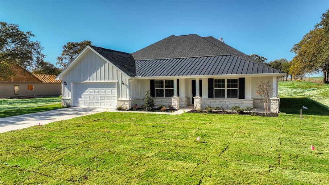 Exterior details and patio area of a home in , Poolville (Image 21).