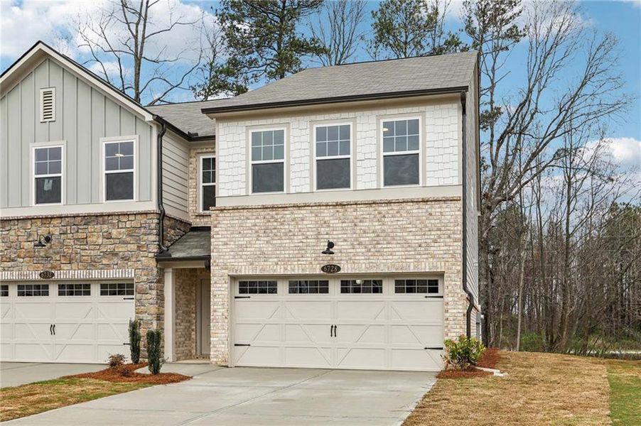 Front exterior of a new home in Leydenview, Mableton, GA, highlighting curb appeal (Image 17).