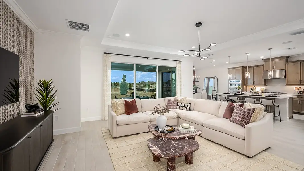 Representative furnished interior of a home built from the Bainbridge by Taylor Morrison in Esplanade at McKinnon Groves, Winter Garden (Image 7).