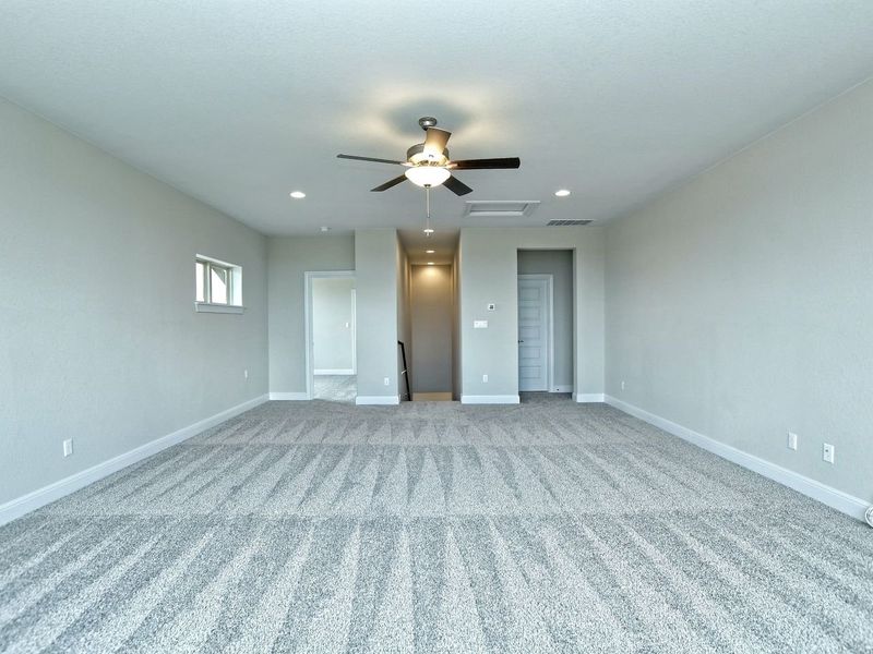 Representative unfurnished interior of a home built from the Madera II by Giddens Homes in Scofield Farms Estates, Georgetown (Image 381).