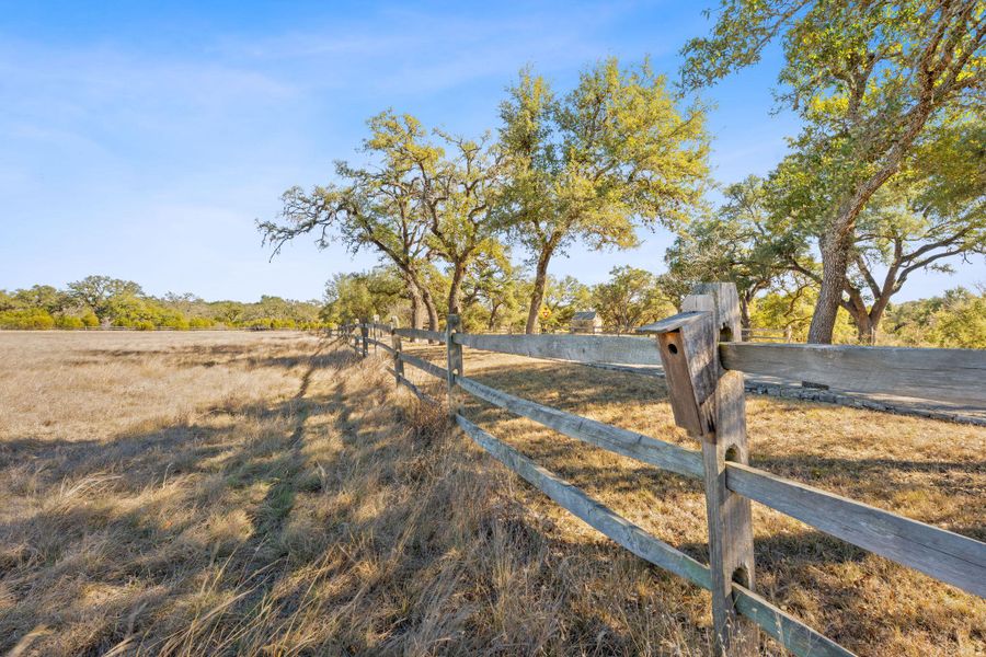 View of yard with a rural view