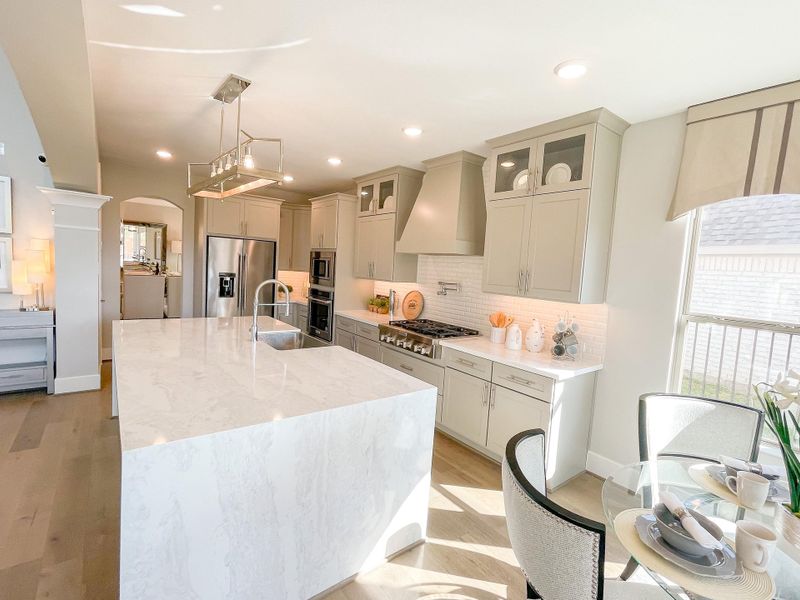 Furnished interior view inside a new home in Bridgeland, Cypress (Image 10).