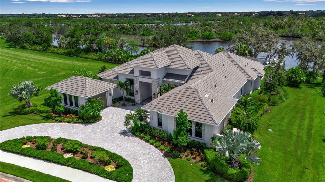 Front exterior of a new home in , Parrish, FL, highlighting curb appeal (Image 23). Front exterior of a new home in , Parrish, FL, highlighting curb appeal (Image 23).