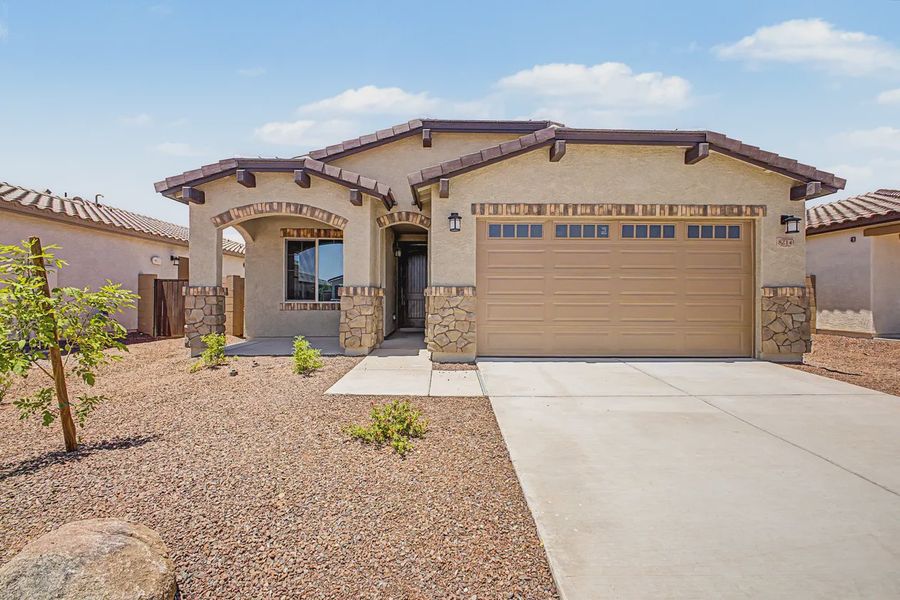 Front exterior of a new home in Avanti at Granite Vista, Waddell, AZ, highlighting curb appeal (Image 21). Front exterior of a new home in Avanti at Granite Vista, Waddell, AZ, highlighting curb appeal (Image 21).