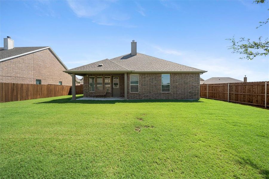 Front exterior of a new home in Aero Vista, Caddo Mills, TX, highlighting curb appeal (Image 23). Front exterior of a new home in Aero Vista, Caddo Mills, TX, highlighting curb appeal (Image 23).