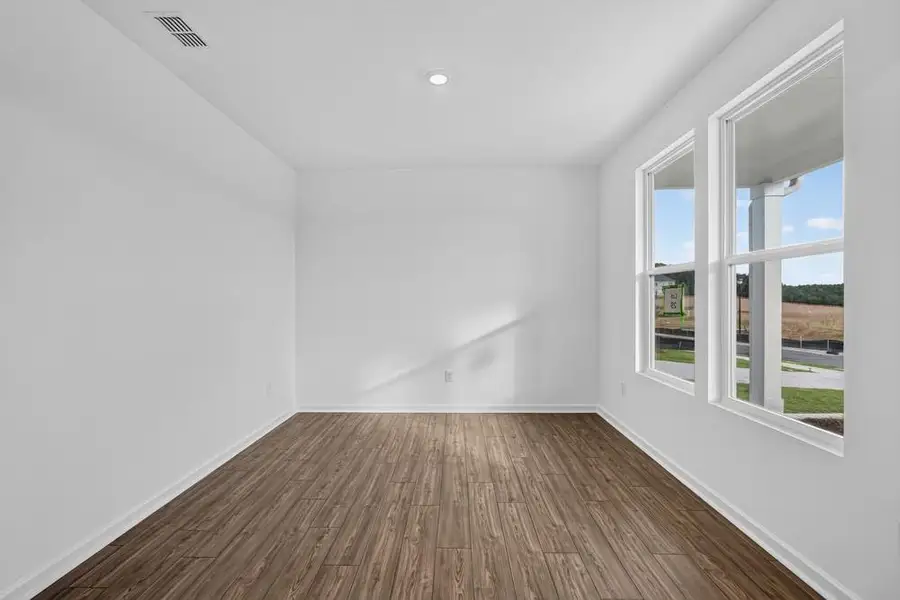 Spacious, unfurnished interior of a new home in Weatherfield, Buford (Image 42).