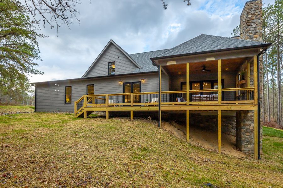 Exterior details and patio area of a home in River Gorge Ranch, Guild (Image 40).