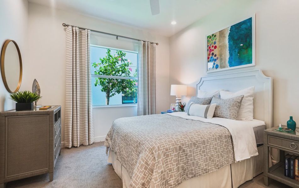 Representative furnished interior of a home built from the Bright Meadow 2 by Neal Communities in SkySail, Naples (Image 14).