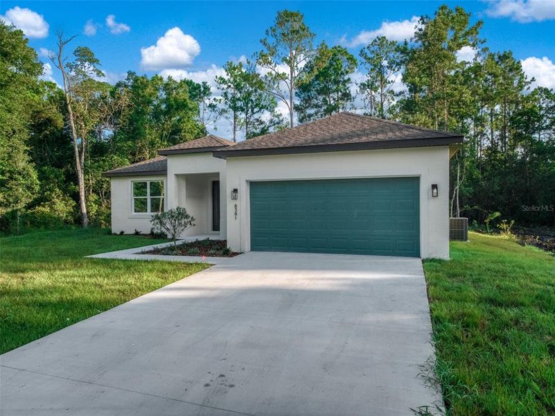 Front exterior of a new home in , Sebring, FL, highlighting curb appeal (Image 1). Front exterior of a new home in , Sebring, FL, highlighting curb appeal (Image 1).