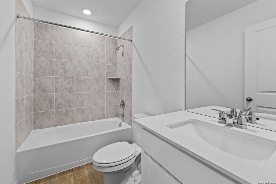Furnished interior view inside a new home in Hickory Ridge, Elmendorf (Image 8).