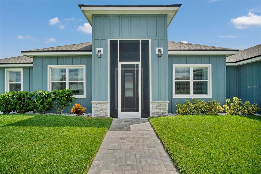 Front exterior of a new home in , Auburndale, FL, highlighting curb appeal (Image 22).