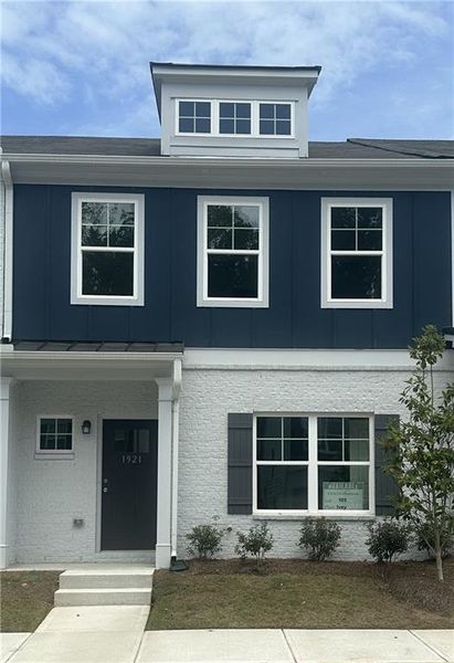 Front exterior of a new home in Shoals Crossing, Conyers, GA, highlighting curb appeal (Image 2). Front exterior of a new home in Shoals Crossing, Conyers, GA, highlighting curb appeal (Image 2).