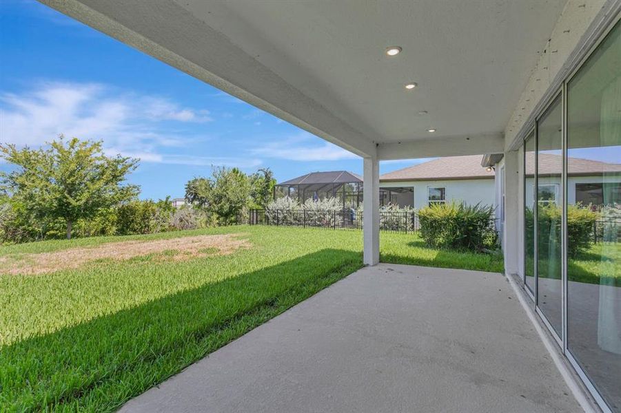 Exterior details and patio area of a home in , Parrish (Image 4). Exterior details and patio area of a home in , Parrish (Image 4).