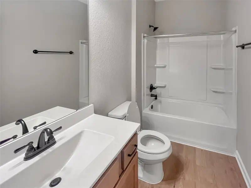 The Oakshire II- Full Secondary Bath. Home under construction.  Sample image for illustration; upgrades, options, and colors may vary.