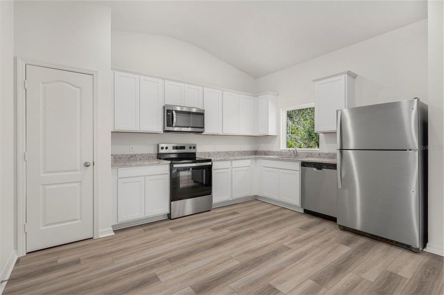 Furnished interior view inside a new home in Poinciana, Poinciana (Image 6).