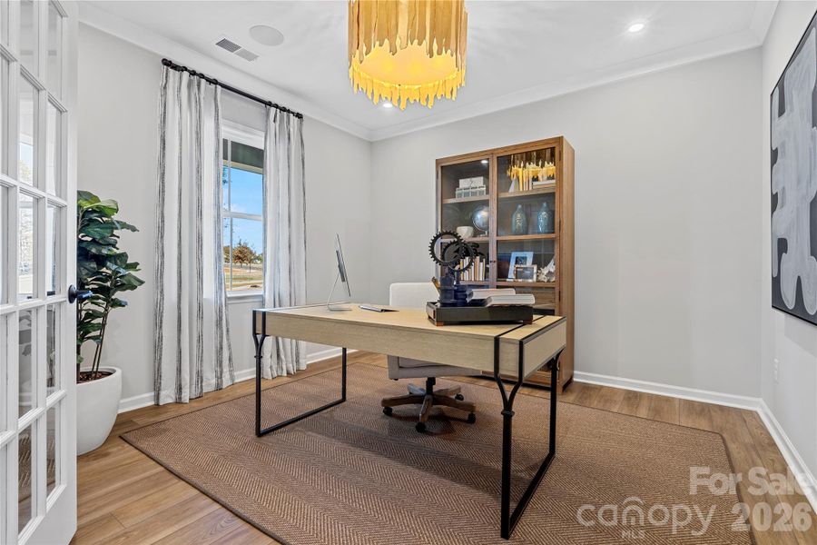 First floor flex space with French doors and limitless possibilities. First floor flex space with French doors and limitless possibilities.