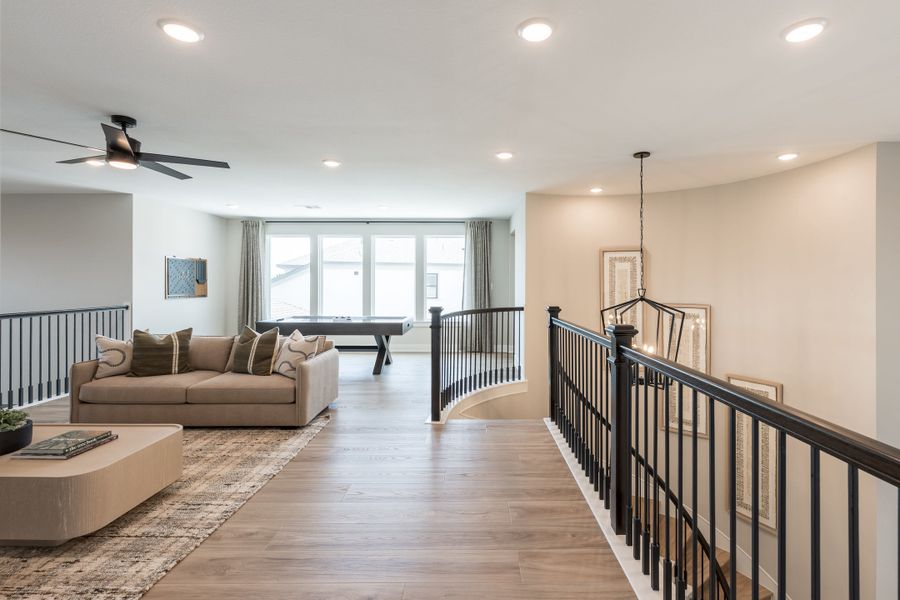 Representative furnished interior of a home built from the Camden by Tri Pointe Homes in Bridgeland, Cypress (Image 41).