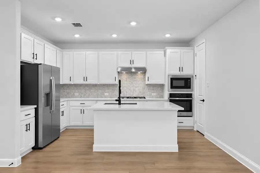 Furnished interior view inside a new home in Cross Creek Meadows, Celina (Image 5).