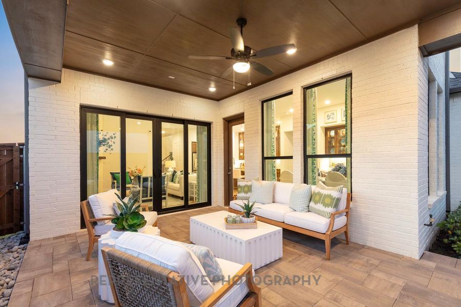 View of patio / terrace featuring ceiling fan and an outdoor hangout area