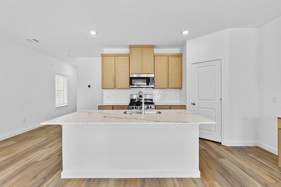 Furnished interior view inside a new home in Grand West, Houston (Image 8).