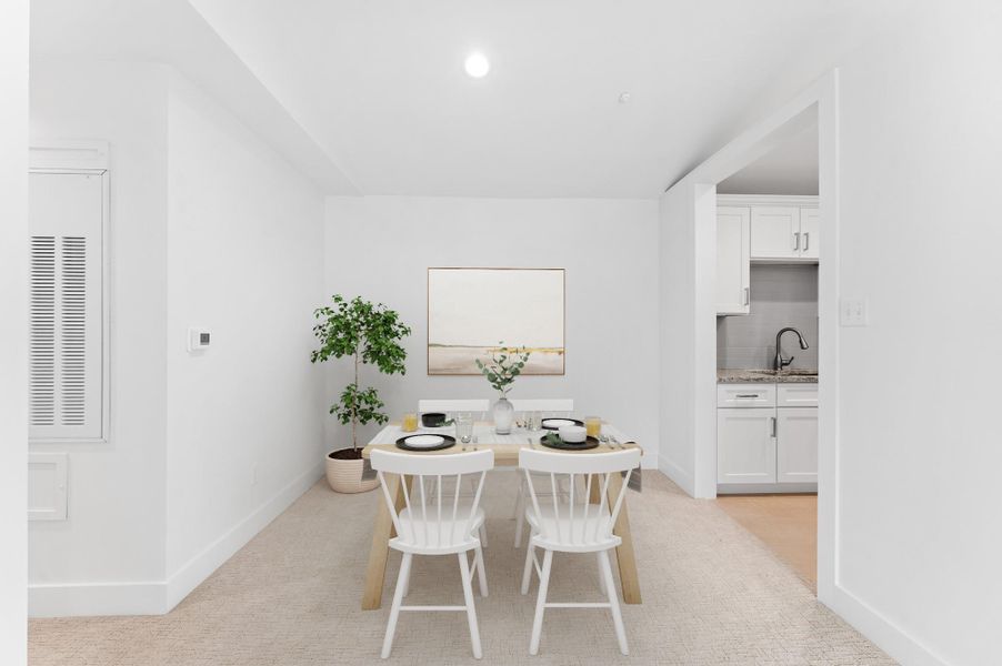 Breakfast area off of the kitchen *Virtually Staged