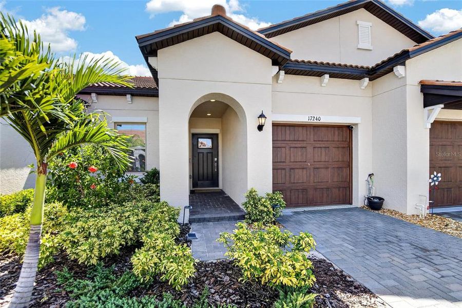 Front exterior of a new home in Southshore Bay Active Adult, Wimauma, FL, highlighting curb appeal (Image 30).