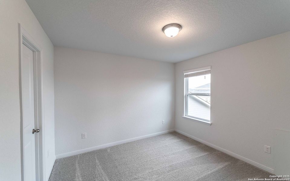 Spacious, unfurnished interior of a new home in Red Hawk Landing, San Antonio (Image 7).