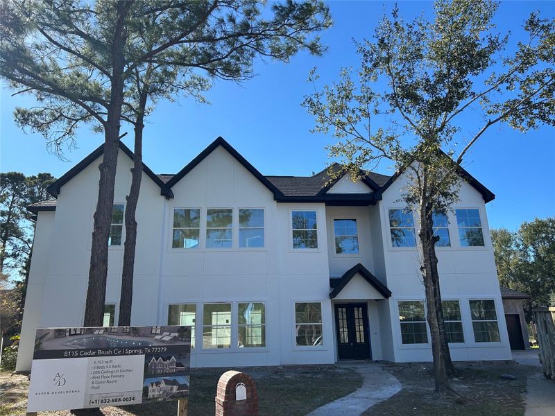 Front exterior of a new home in , Spring, TX, highlighting curb appeal (Image 4).