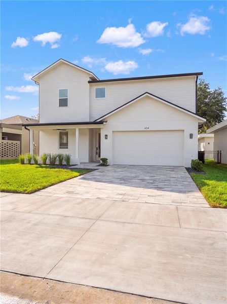 Front exterior of a new home in , Lady Lake, FL, highlighting curb appeal (Image 29). Front exterior of a new home in , Lady Lake, FL, highlighting curb appeal (Image 29).