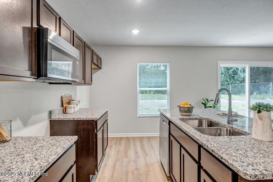 Furnished interior view inside a new home in , Jacksonville (Image 7). Furnished interior view inside a new home in , Jacksonville (Image 7).