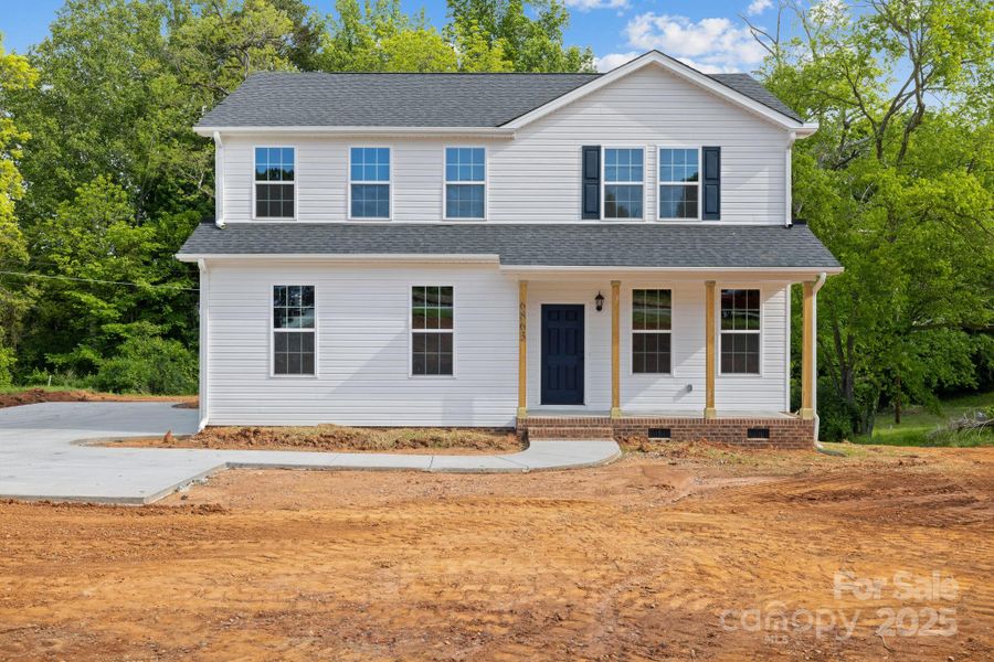 Front exterior of a new home in , Hickory, NC, highlighting curb appeal (Image 1).