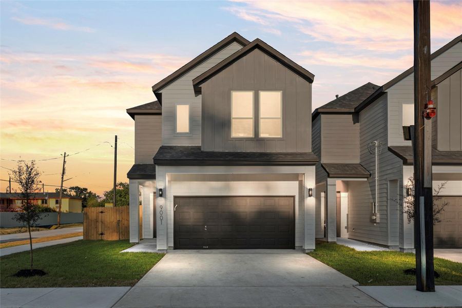 Front exterior of a new home in , Houston, TX, highlighting curb appeal (Image 1).