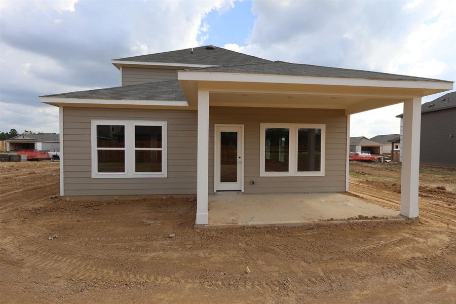 Front exterior of a new home in Indian Springs, Crosby, TX, highlighting curb appeal (Image 2).