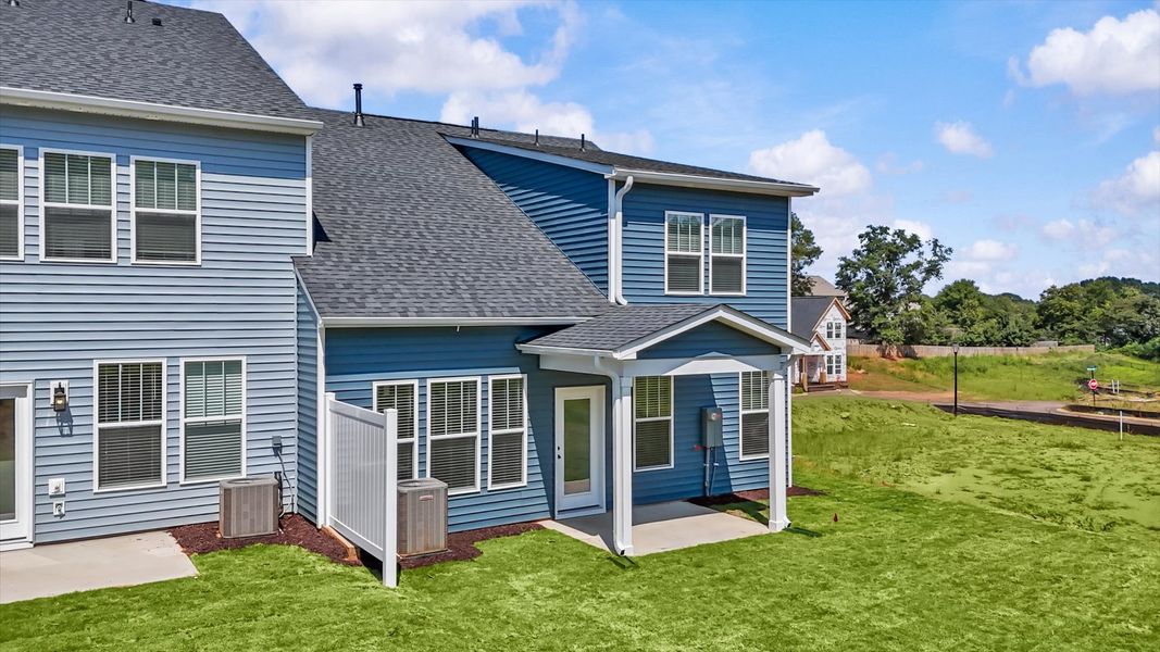 Exclusive rear covered porch with accomplished detail and elevated outdoor living potential