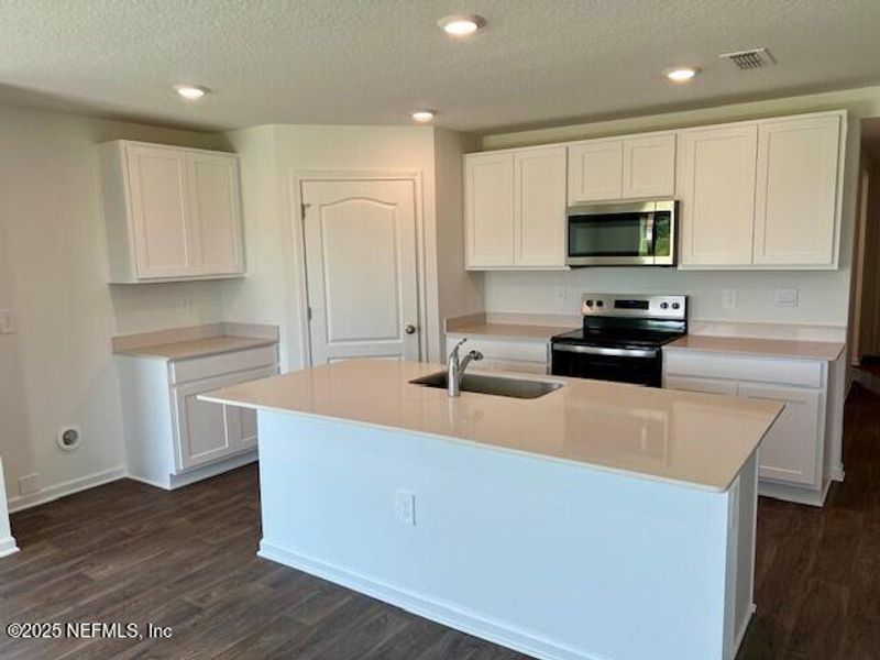 Furnished interior view inside a new home in Rookery, Green Cove Springs (Image 4). Furnished interior view inside a new home in Rookery, Green Cove Springs (Image 4).
