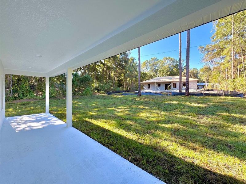 Exterior details and patio area of a home in , Citrus Springs (Image 2).