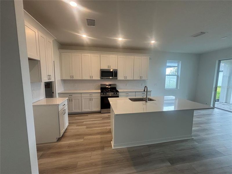Furnished interior view inside a new home in Coasterra, Palmetto (Image 10).