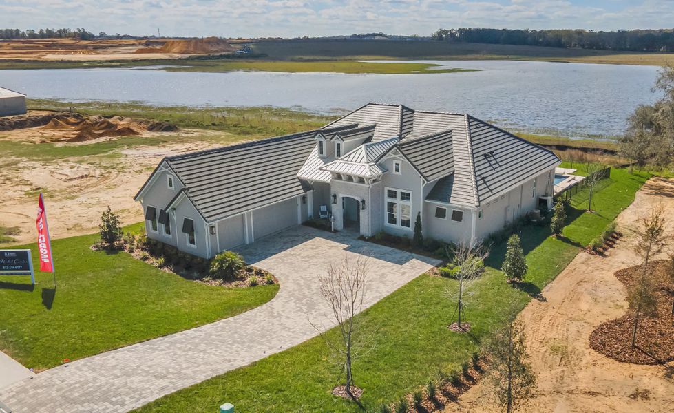 Front exterior of a new home in West Hill Estates, Dade City, FL, highlighting curb appeal (Image 20).