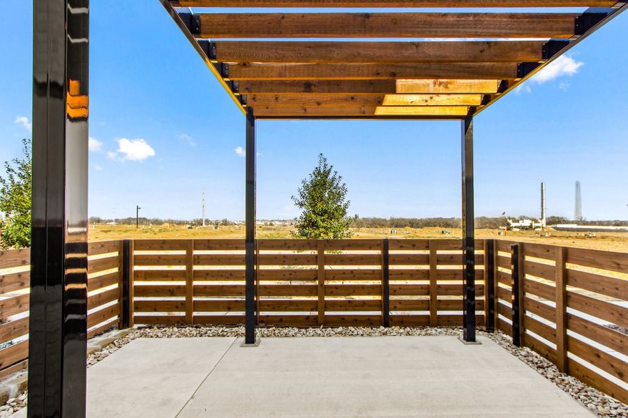 Exterior details and patio area of a home in Wildridge, Oak Point (Image 26).