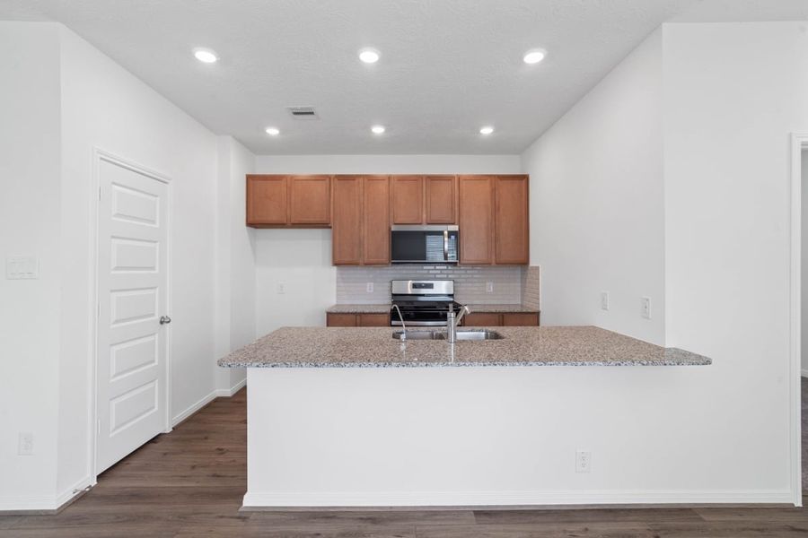 Furnished interior view inside a new home in Mustang Ridge, Magnolia (Image 5).